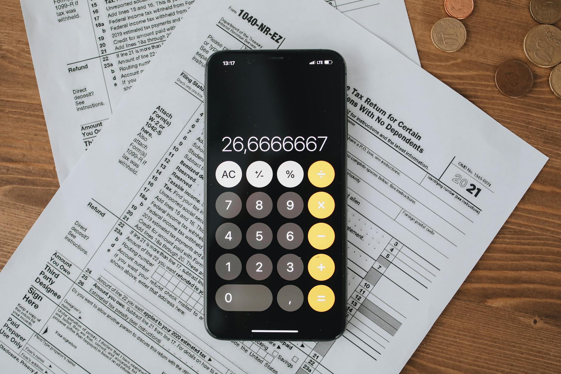 Tax paperwork and calculator illustrating crypto tax obligations in the UK
