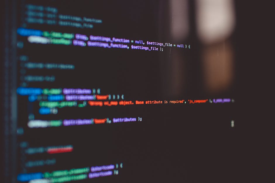 Close-up of colourful programming code on a screen