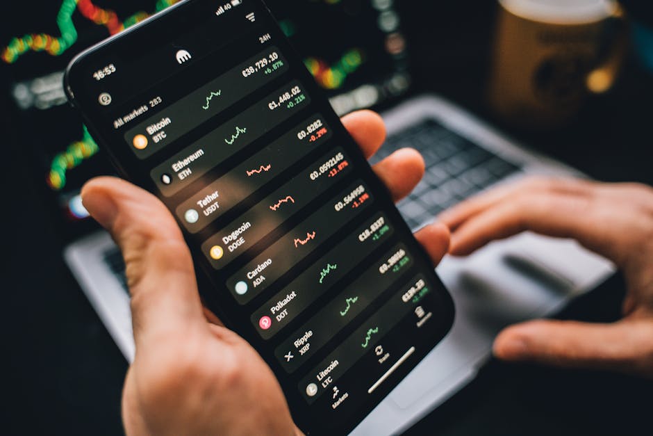 Smartphone showing cryptocurrency market data for a decentralised finance explainer