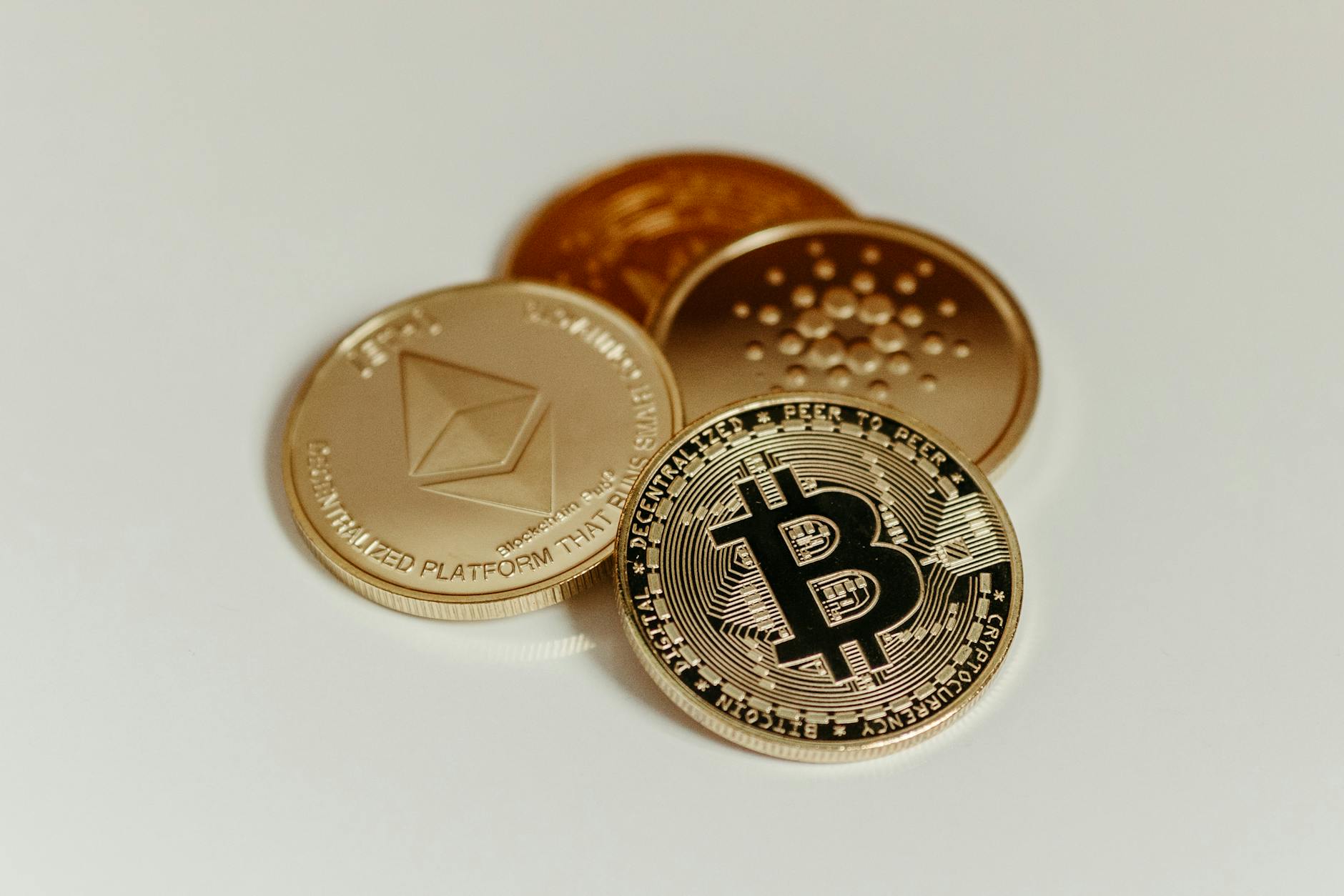 Coin vs token concept illustrated through cryptocurrency imagery