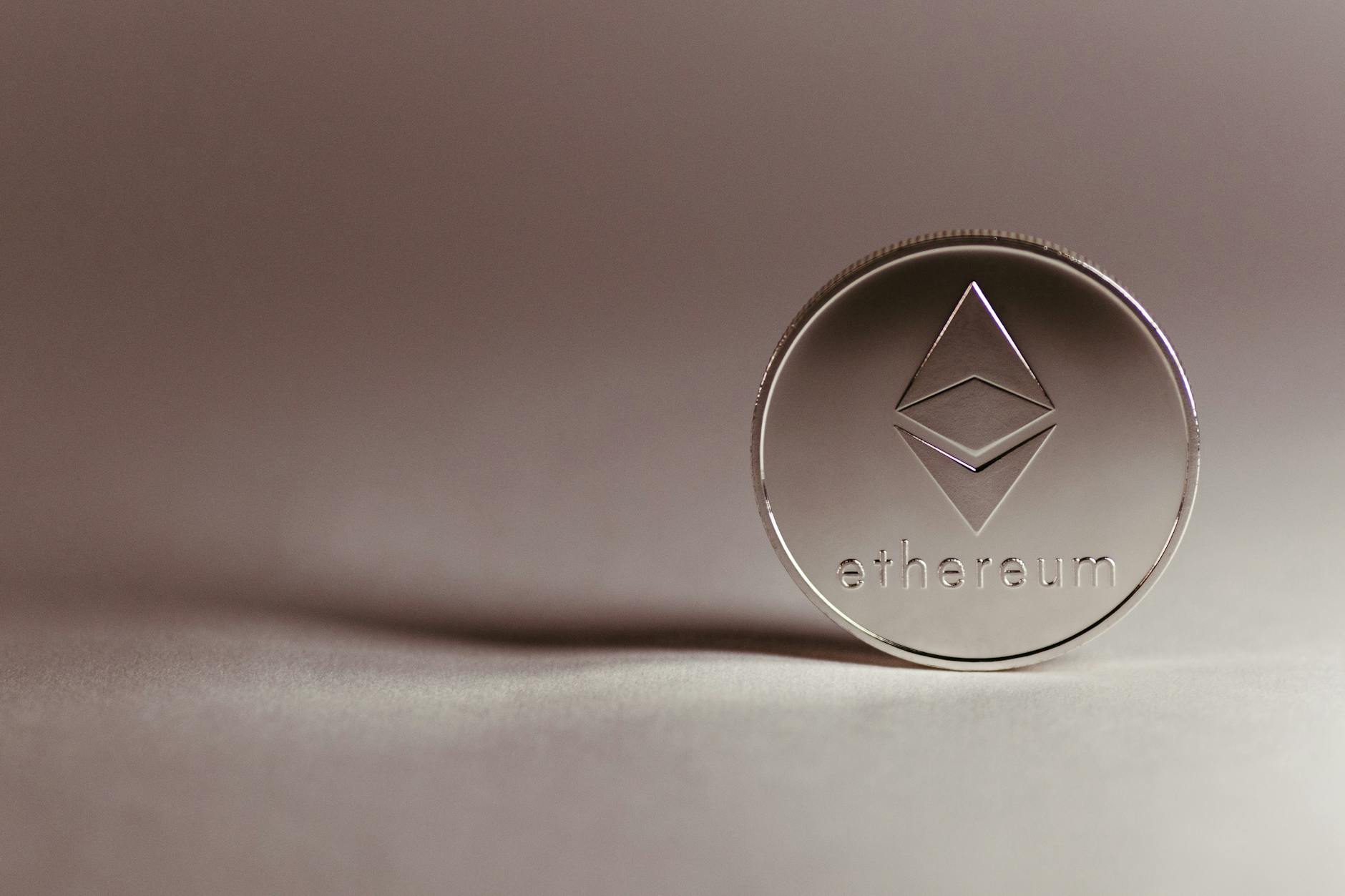 Ethereum explained: digital coin on circuit board representing blockchain smart contracts