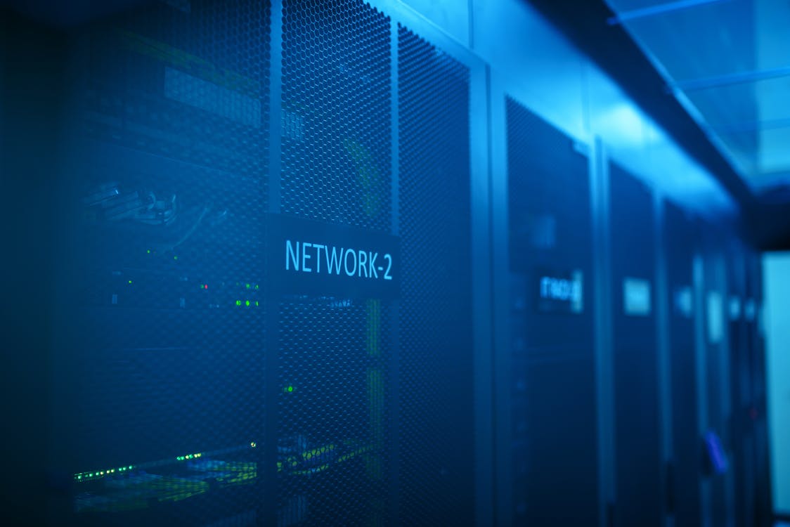 Server room with blue lighting representing Solana blockchain high-performance infrastructure