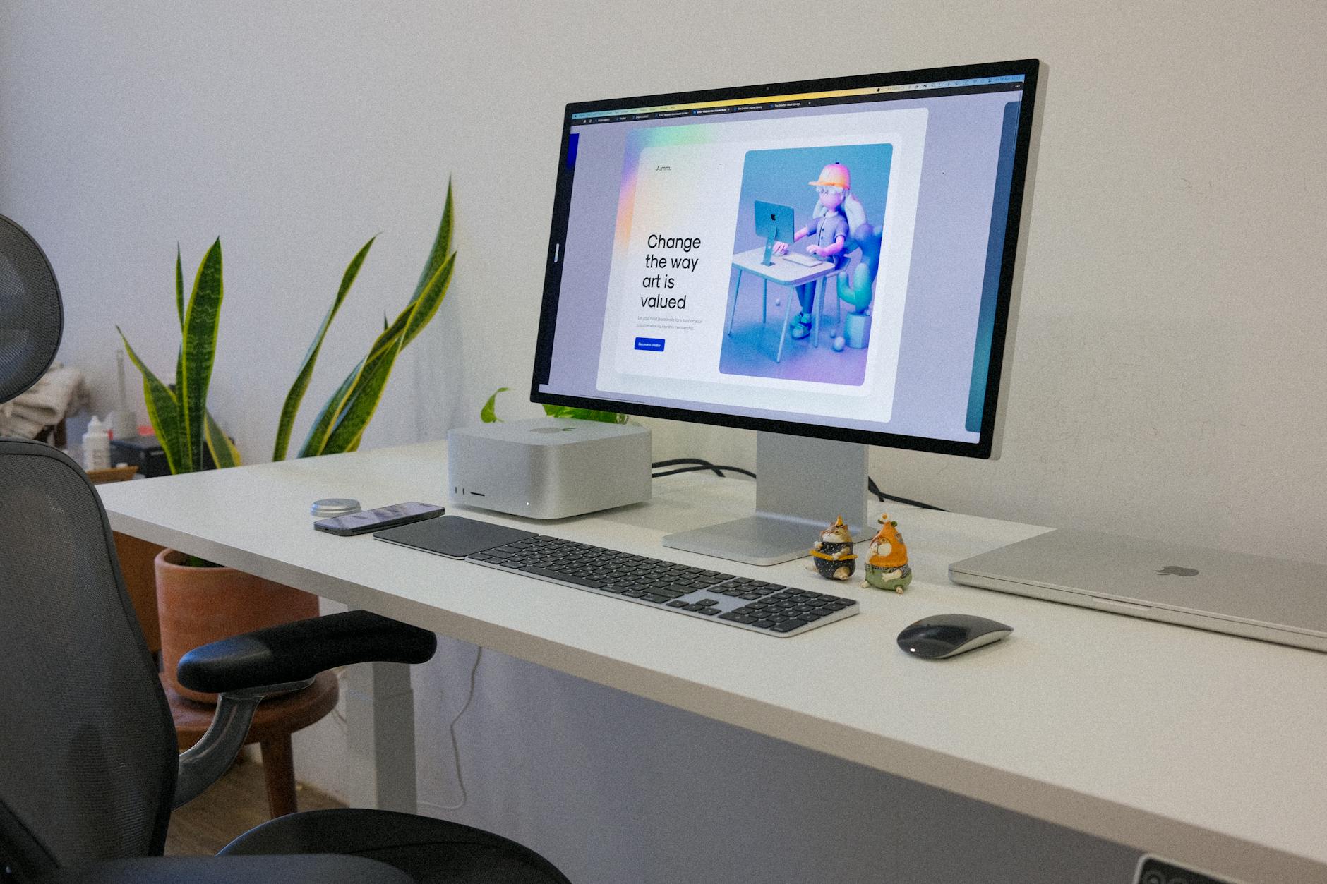 A compact desktop computer setup on a wooden desk, representing on-device AI computing