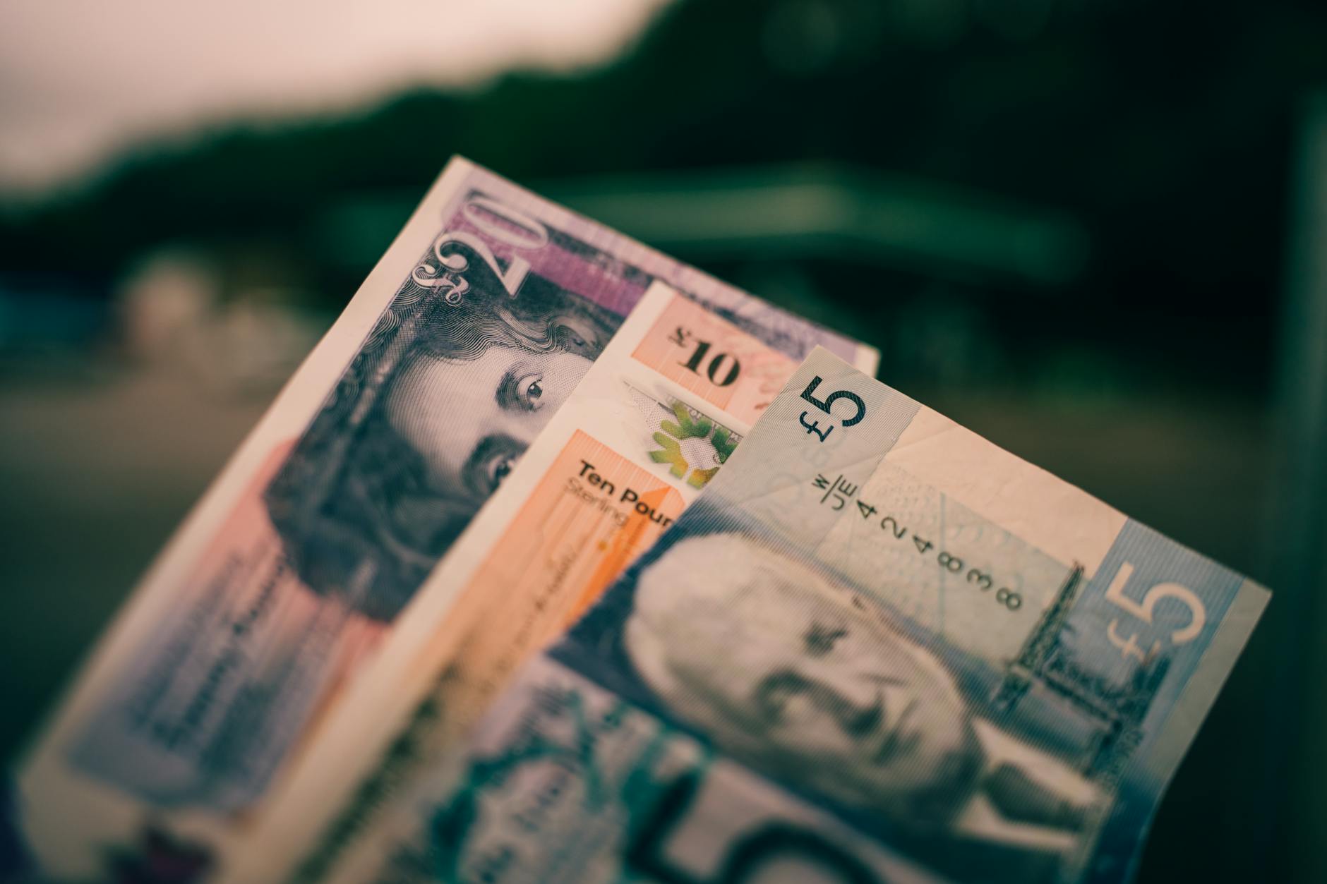 British pound notes representing fiat currency backed by government decree