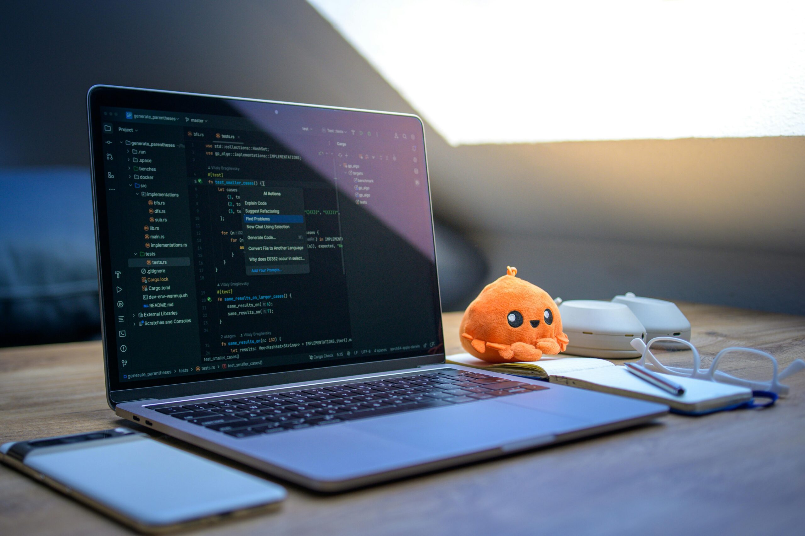 Developer working at a laptop in a modern technology workspace
