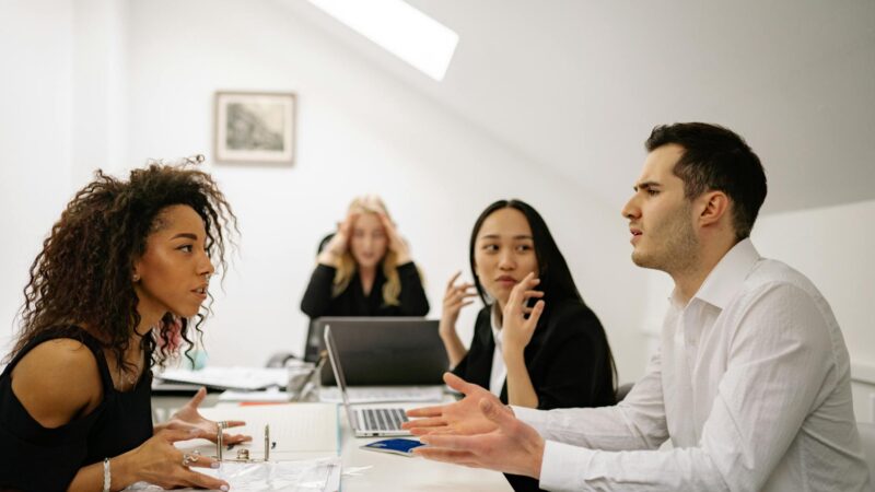 AI difficult conversations preparation shown as a person reviewing notes before a meeting