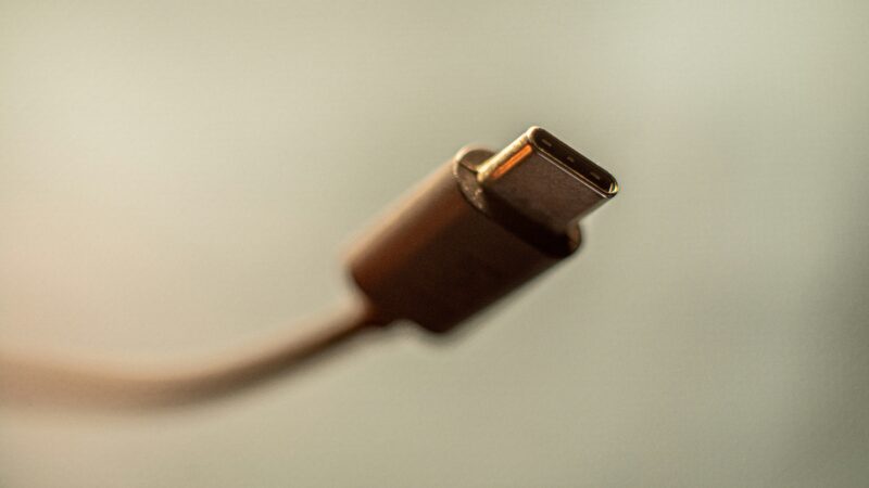 USB-C explained with a cable connected to a laptop for charging, data and display support