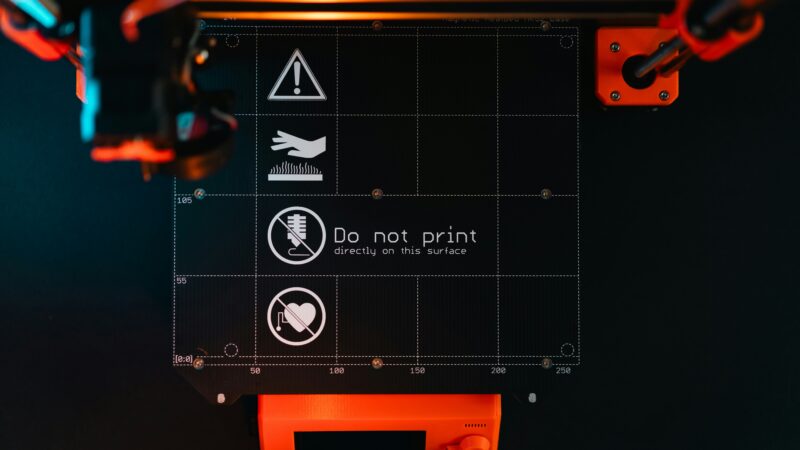 Home 3D printing: close-up of a consumer 3D printer producing a plastic object