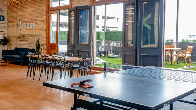 Institutional investors buying small-cap stocks: a coworking space representing where fund managers and retail investors share the market