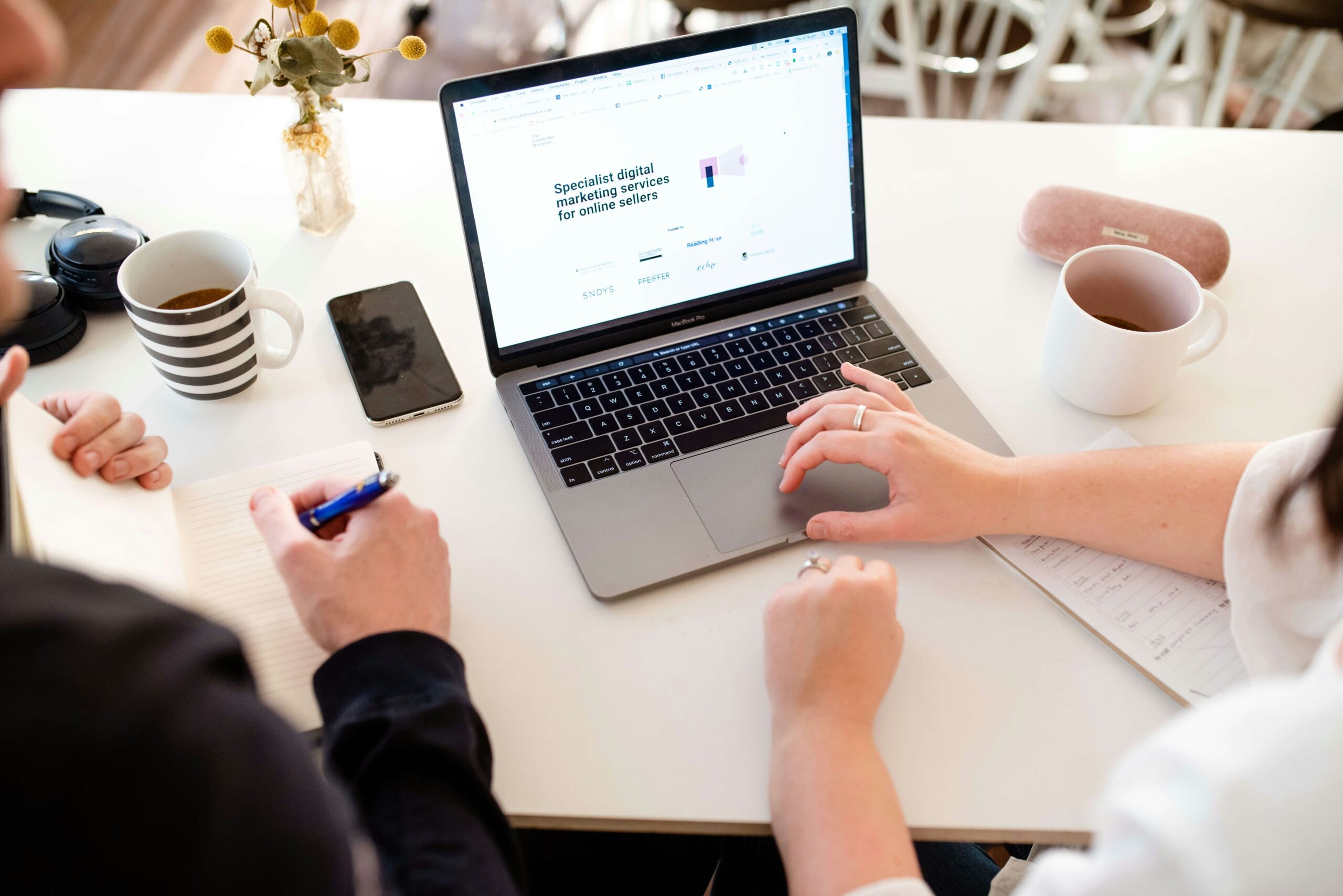 Developer workspace with laptop, representing AI product development