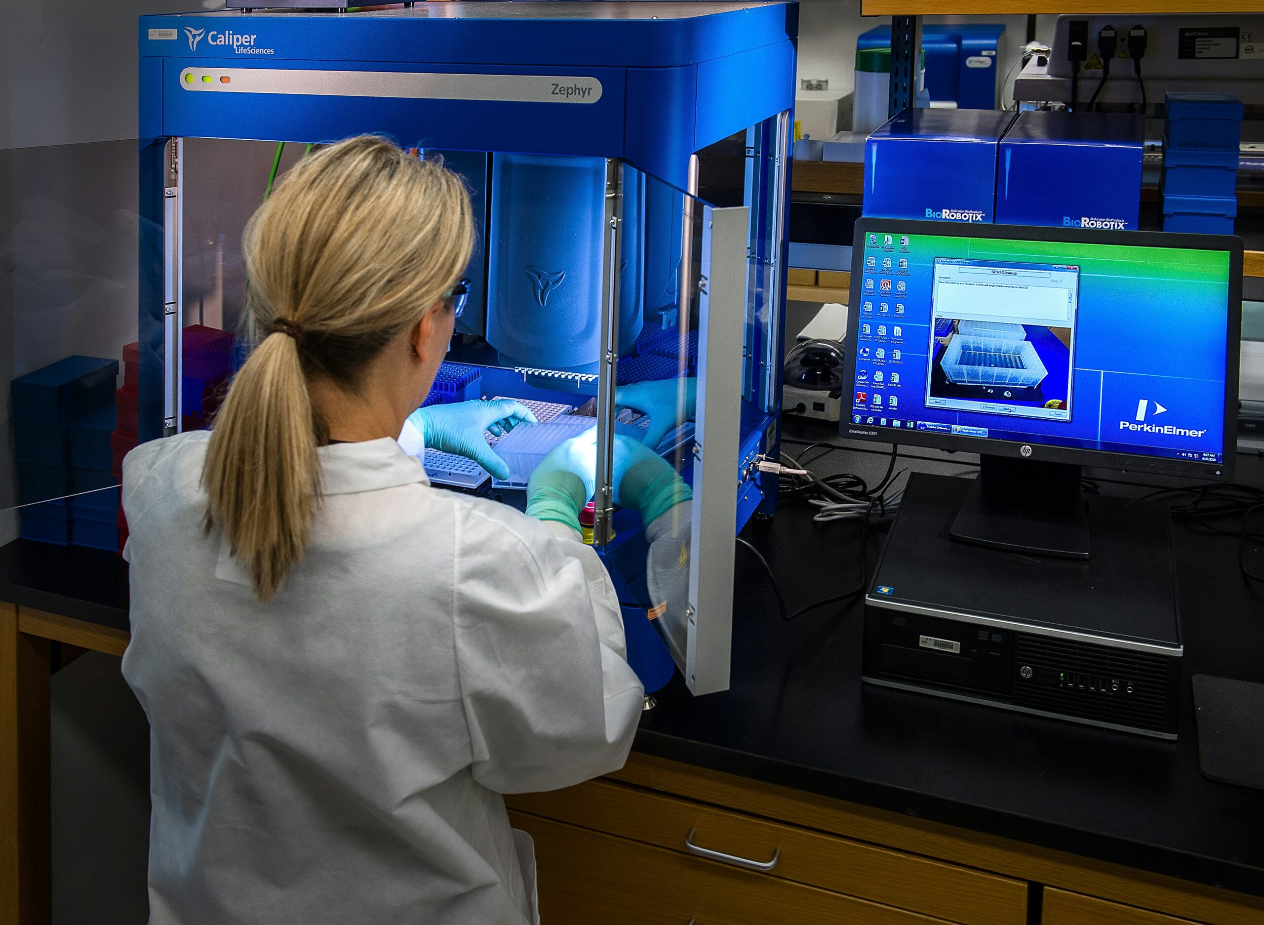 AI research laboratory with screens showing data visualisations