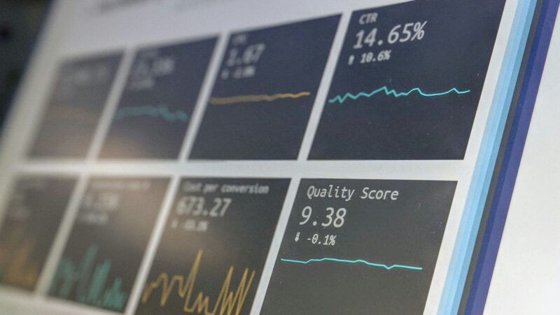 Profit and loss statement on a screen used for UK investing education