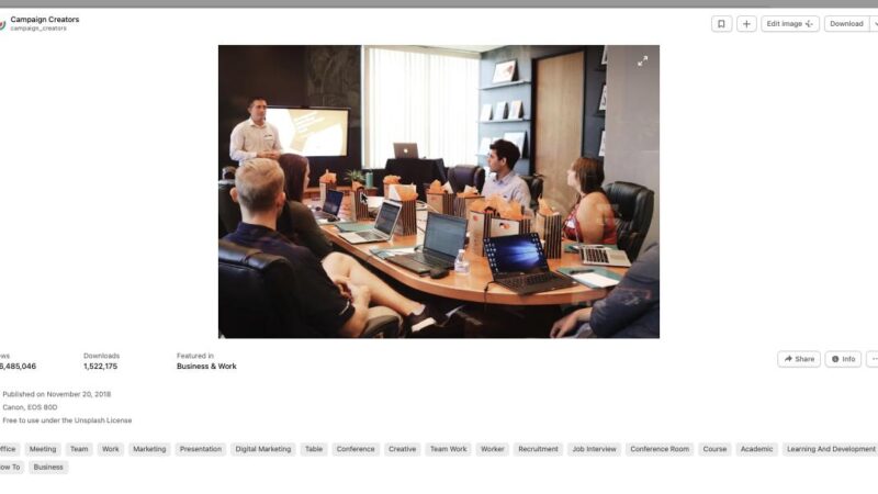 Team reviewing an AI-generated slide deck in a meeting room.