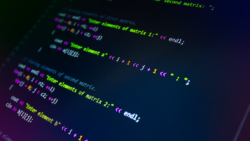 Colourful programming code on screen representing AI code quality testing