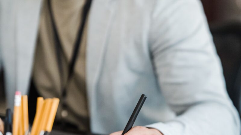 Designer working on a graphics tablet, representing AI plugging into creative tools