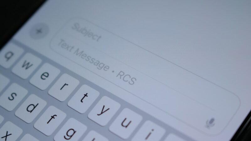 iPhone and Android message thread showing RCS messaging features and green bubbles.