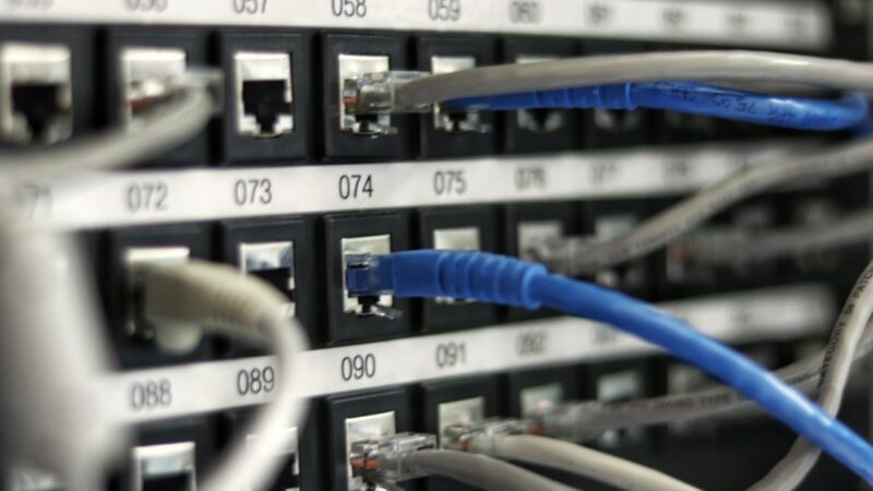 Network cables and server hardware representing outside data flowing into smart contracts.