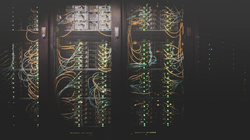 Network cabling and servers showing the infrastructure behind AI latency and response time.