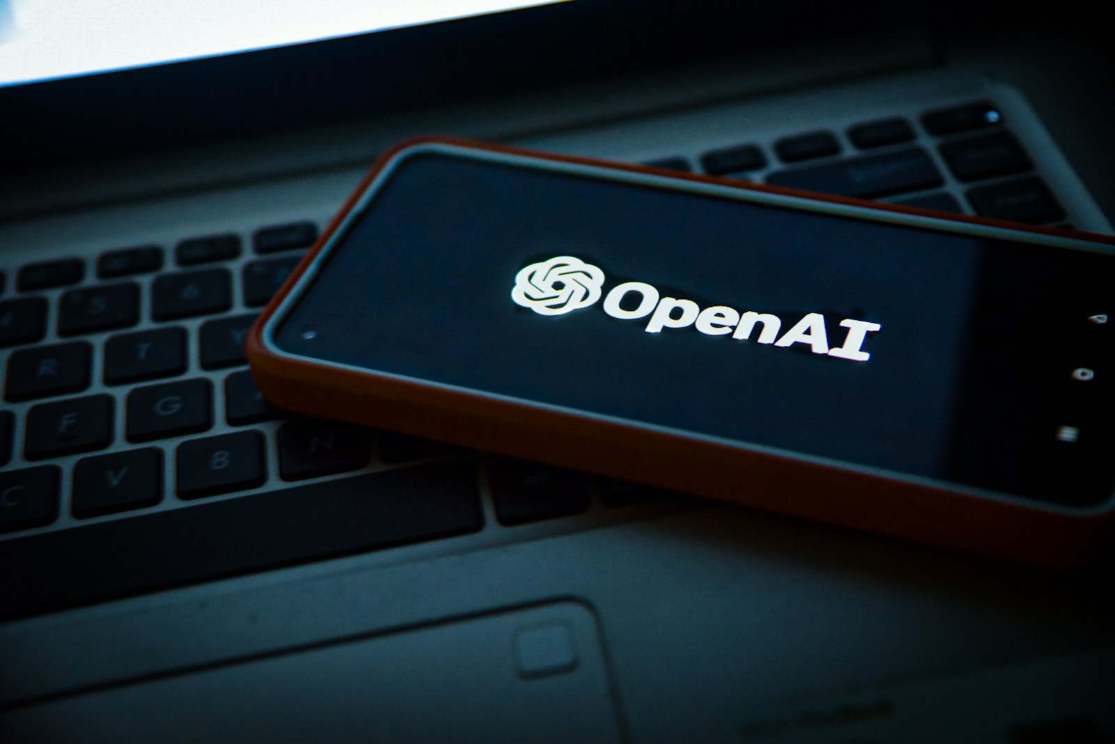 ChatGPT shown on a laptop and phone as AI tools move into daily work