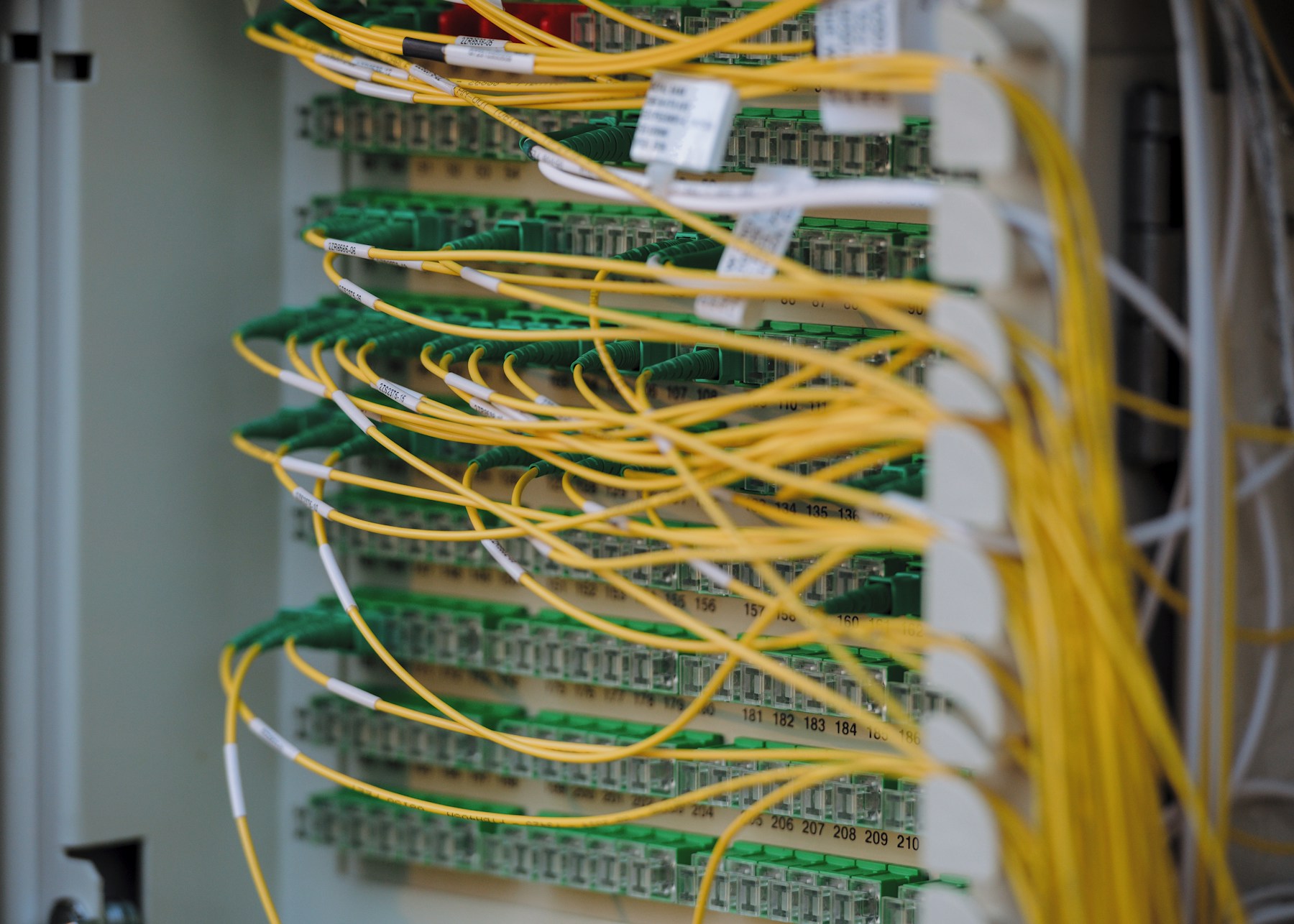 Server racks in a data centre supporting AI infrastructure