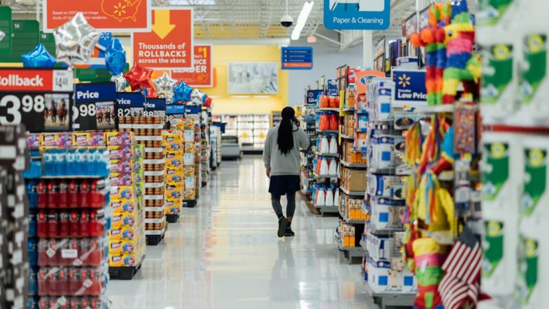 Shopping basket, household bills and cash savings representing inflation reducing real spending power
